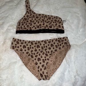 NWOT reversible Venus swimsuit. Animal print.